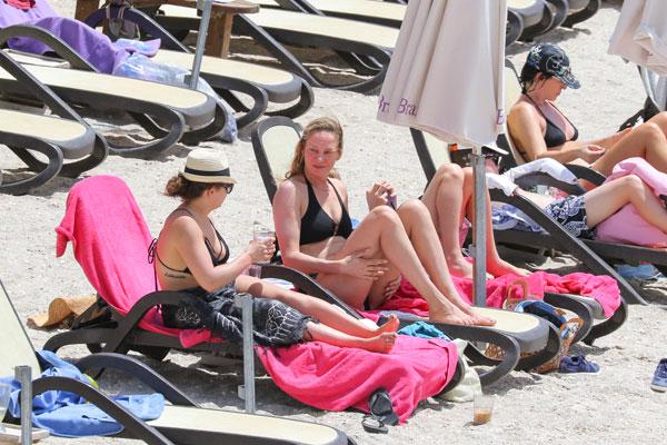 Sexier Than Ever At Uma Thurman Prances In Black Bikini In St