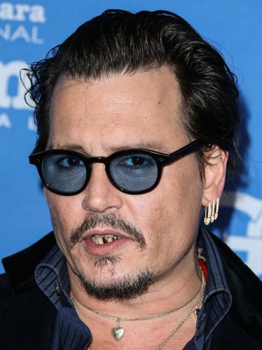 Former Sex Symbol Johnny Depp Spotted With Yellow Teeth