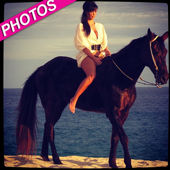 Bareback Bikini Babe Kim Kardashian Rides A Large Stallion On The Beach