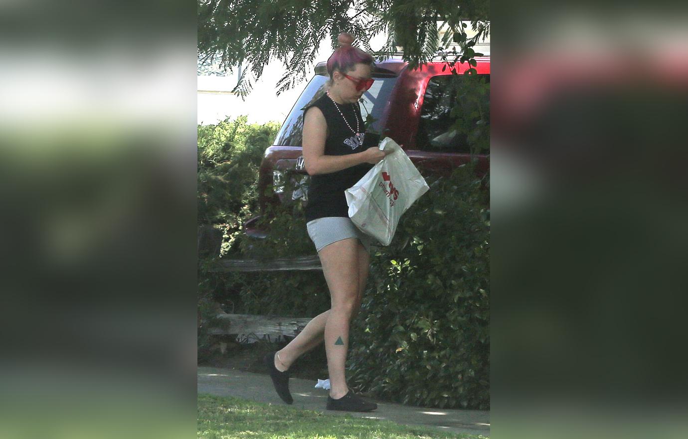 Amanda Bynes Looks Glum In Rare Photos After Rehab