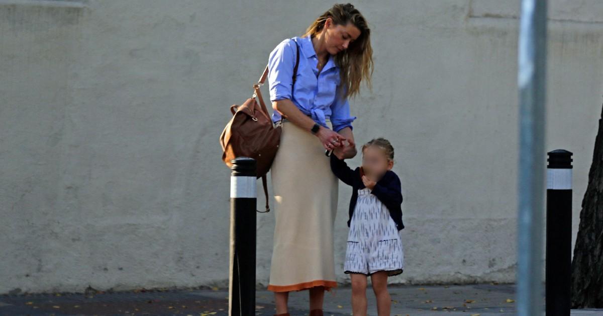 amber heard seen in madrid with daughter radar