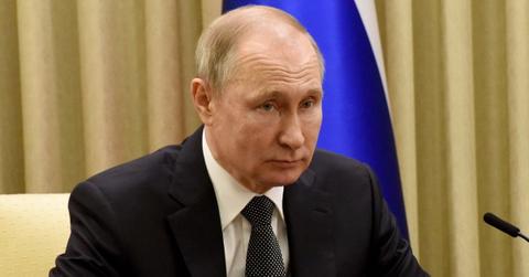 Vladimir Putin Bloated & Slouching In New Photo Suggesting He Is Sick