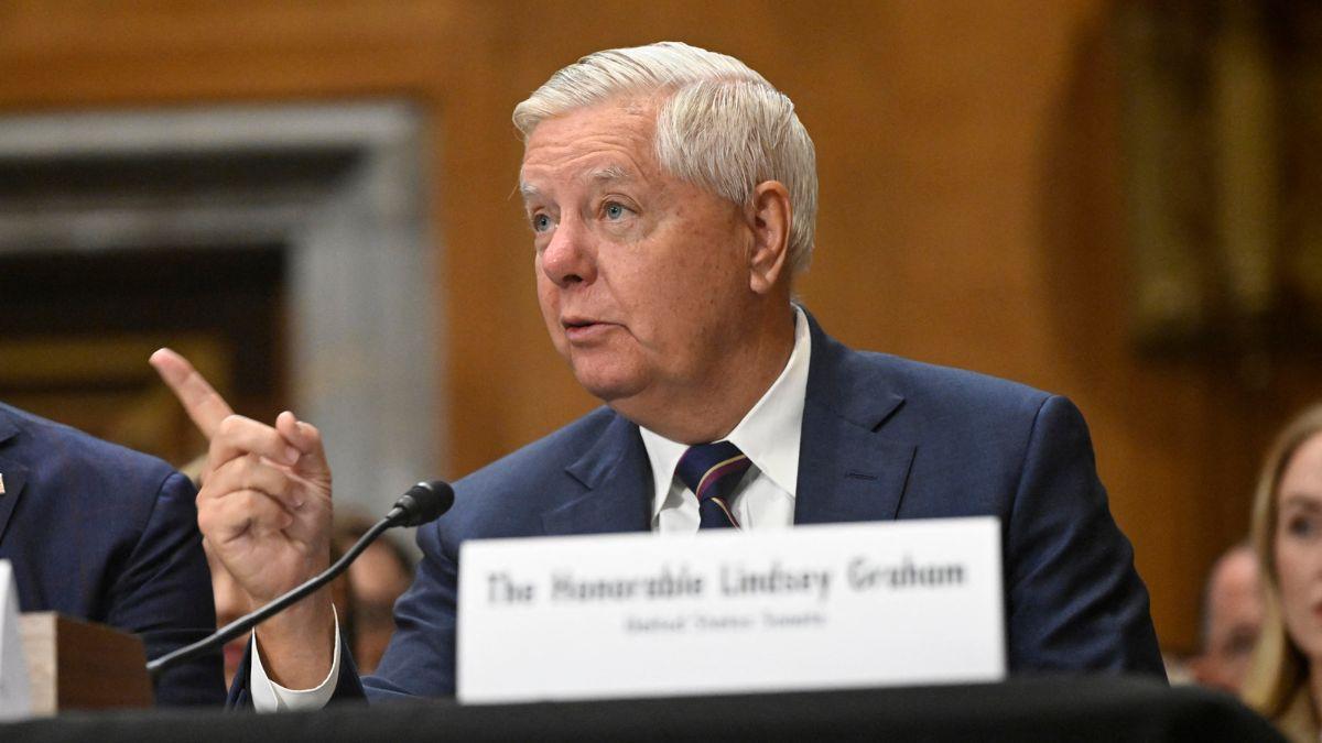 image of Donald Trump was criticized after adding unscripted remarks during Lindsey Graham's eulogy.