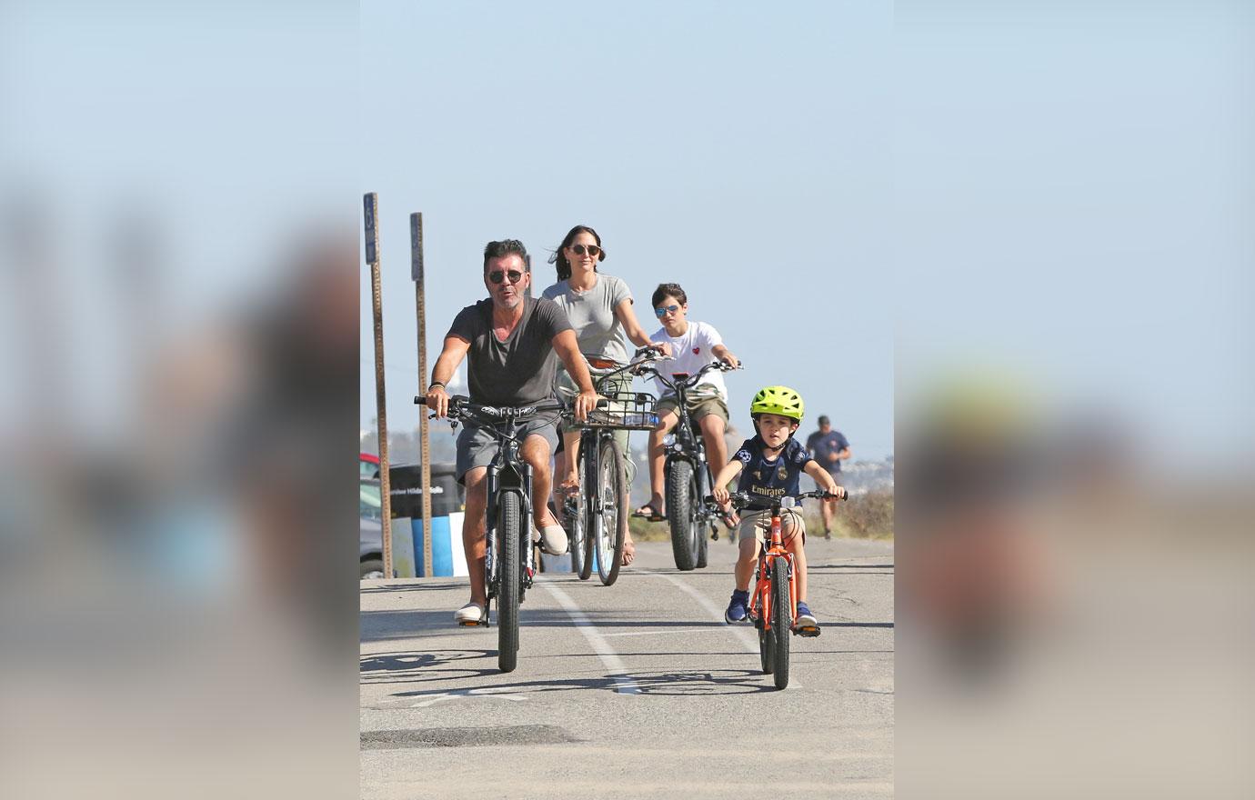 Simon Cowell Goes Bike Riding With His Family