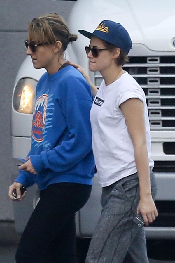 //kristen stewart puts arm around girlfriend