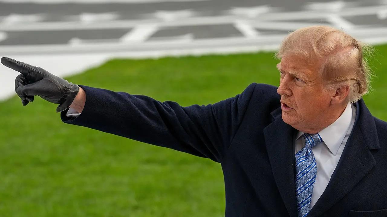 The gloves raised new questions about his bruised hands.