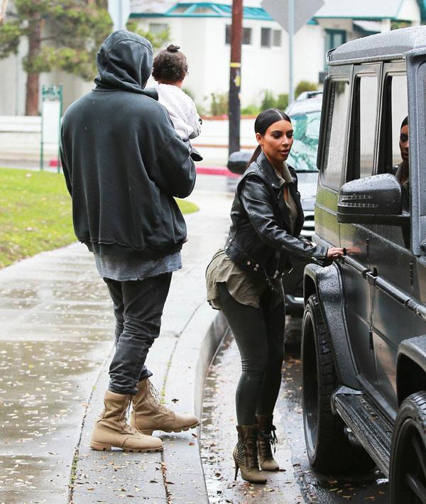 Kanye Kisses North West