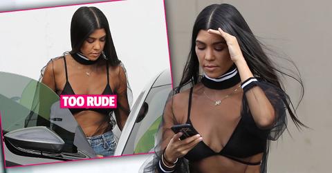 kourtney kardashian shows bra mesh top