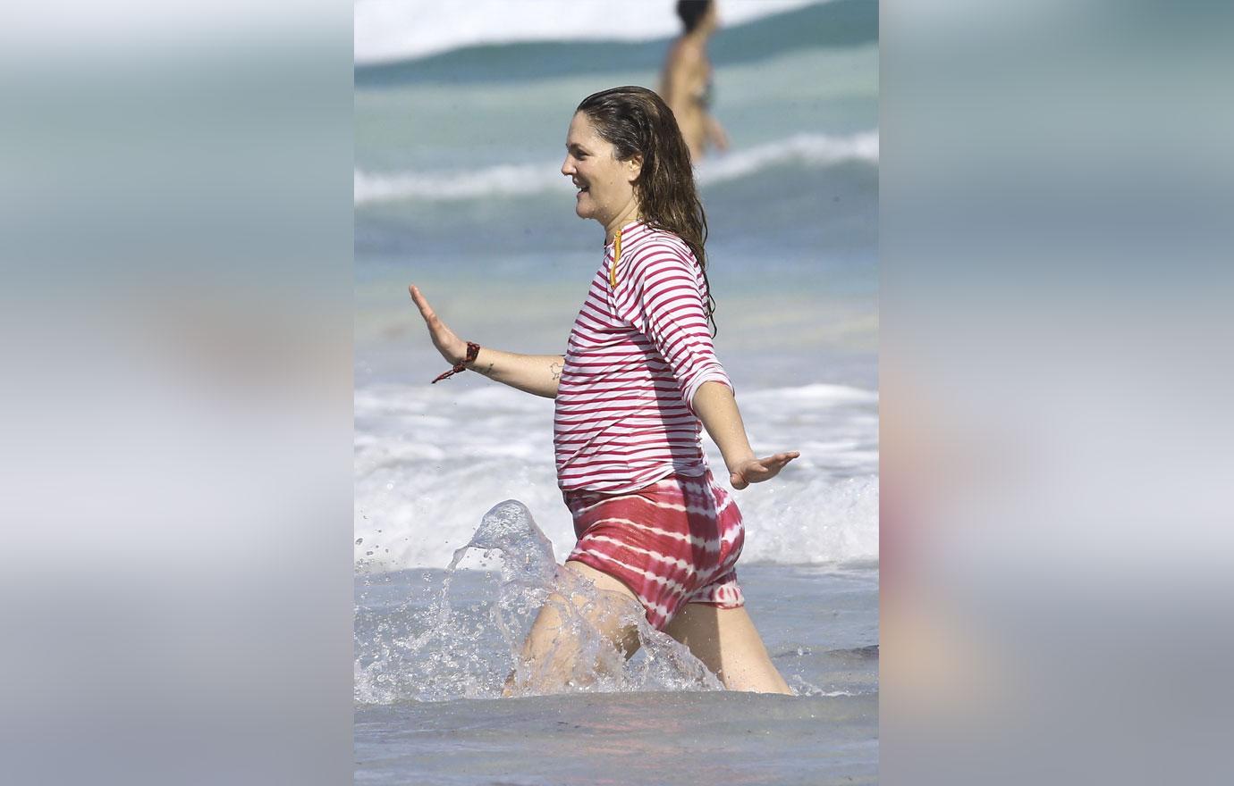 //drew barrymore bikini wetsuit boobs belly mexico