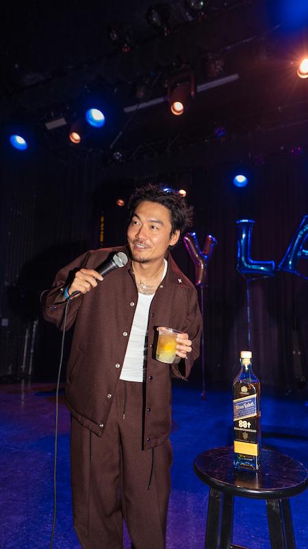 dumbfoundead cheers with johnnie walker blue label at his cry later comedy show presented by goldenvoice rising in los angeles ca