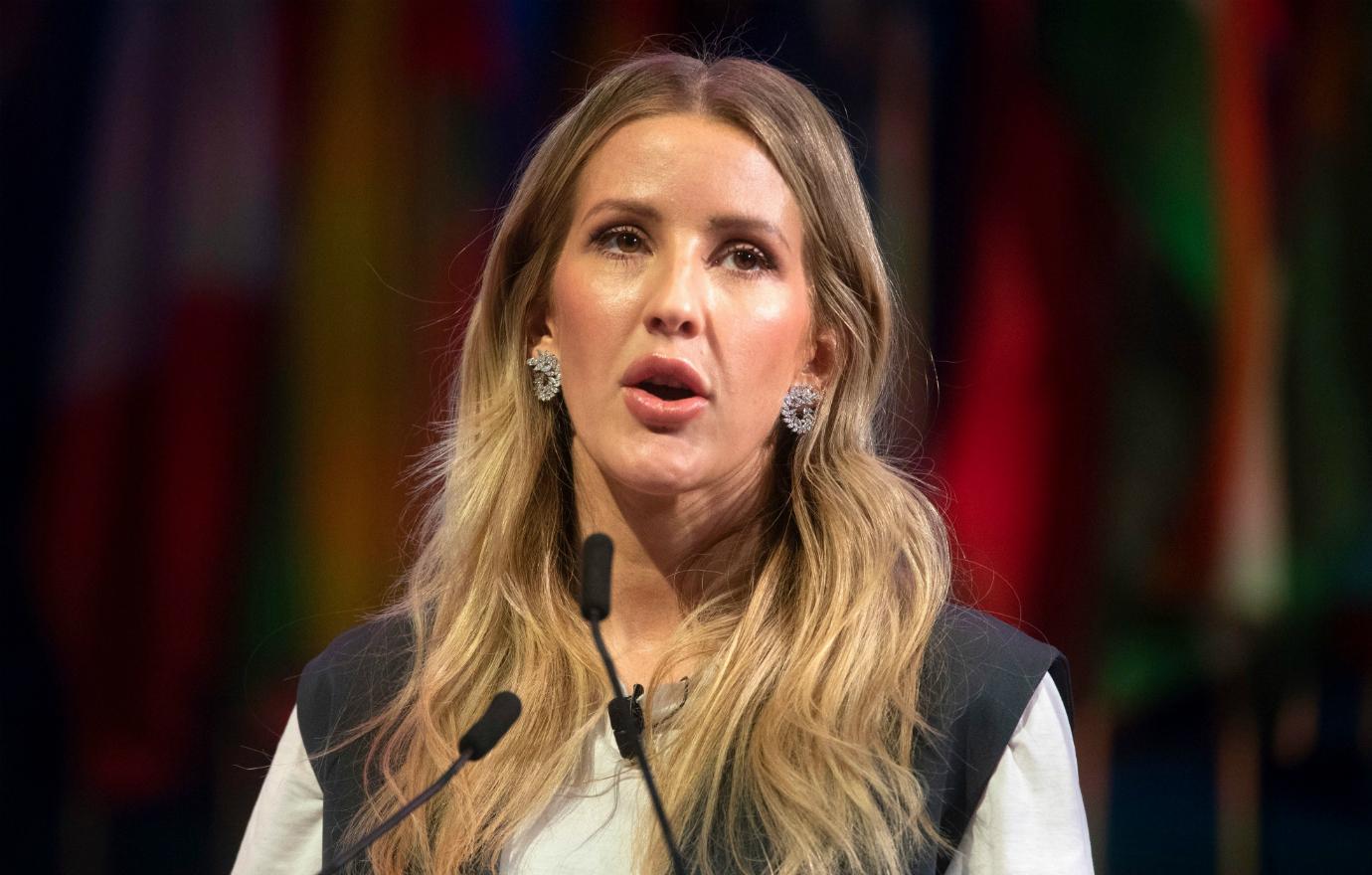 Singer Ellie Goulding made a speech at the One Young World Summit in London and wore a grey vest over a white oxford shirt.