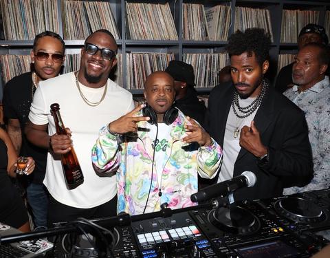 dj mos celebrating his birthday with a tequila don julio toast while jermaine dupri is djing at his party in los angeles this weekend with dj ruckus