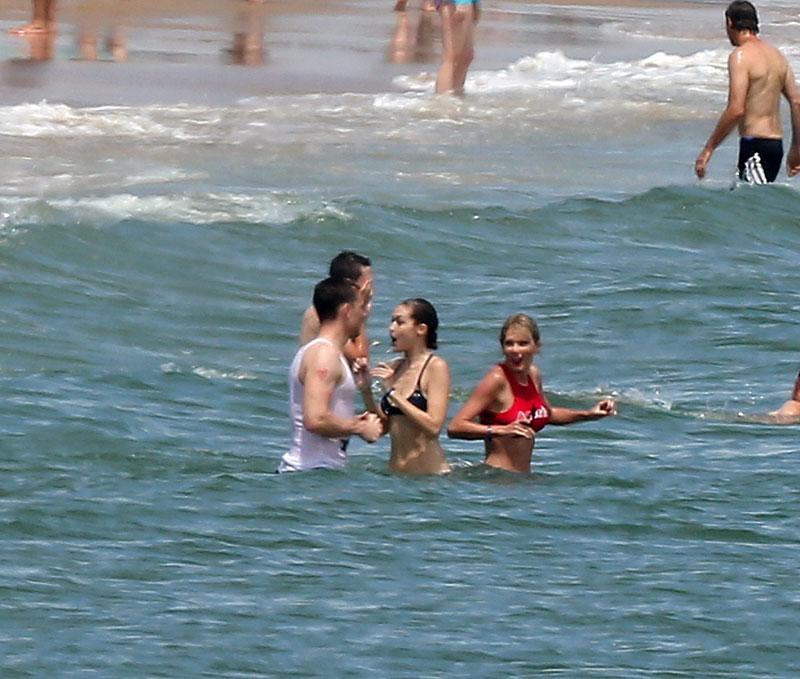 Tom Hiddleston Meets Taylor Swift's Bikini-Clad Squad -- Photos