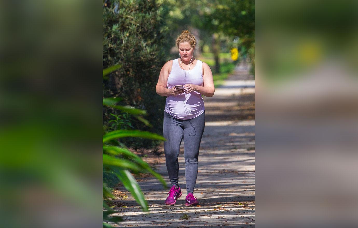 Pregnant Amy Schumer Shows Off Baby Bump During MakeupFree Stroll