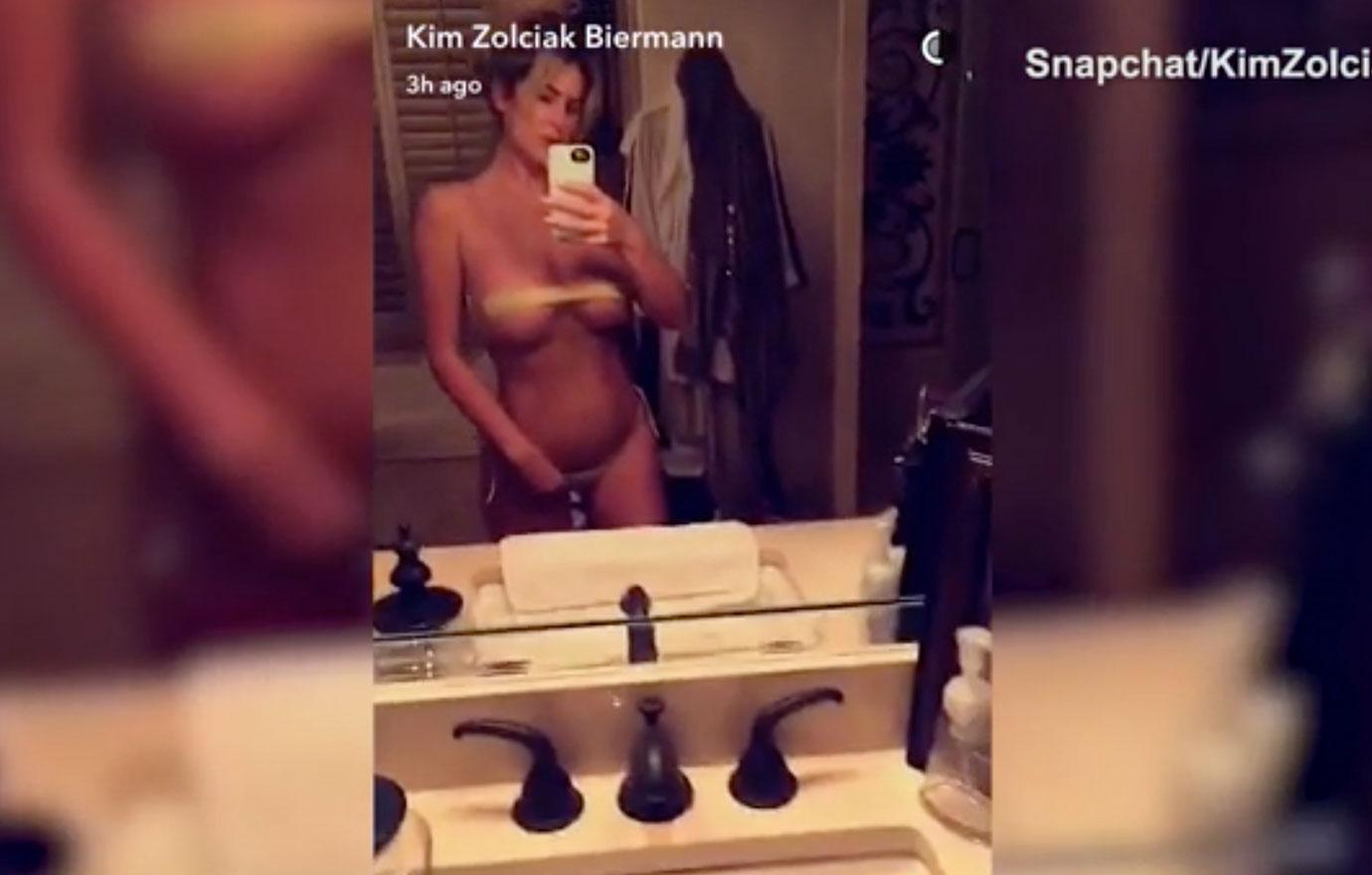 Kim Zolciak Puts Boobs On Display In A Bizarre See-Through Bikini photo picture