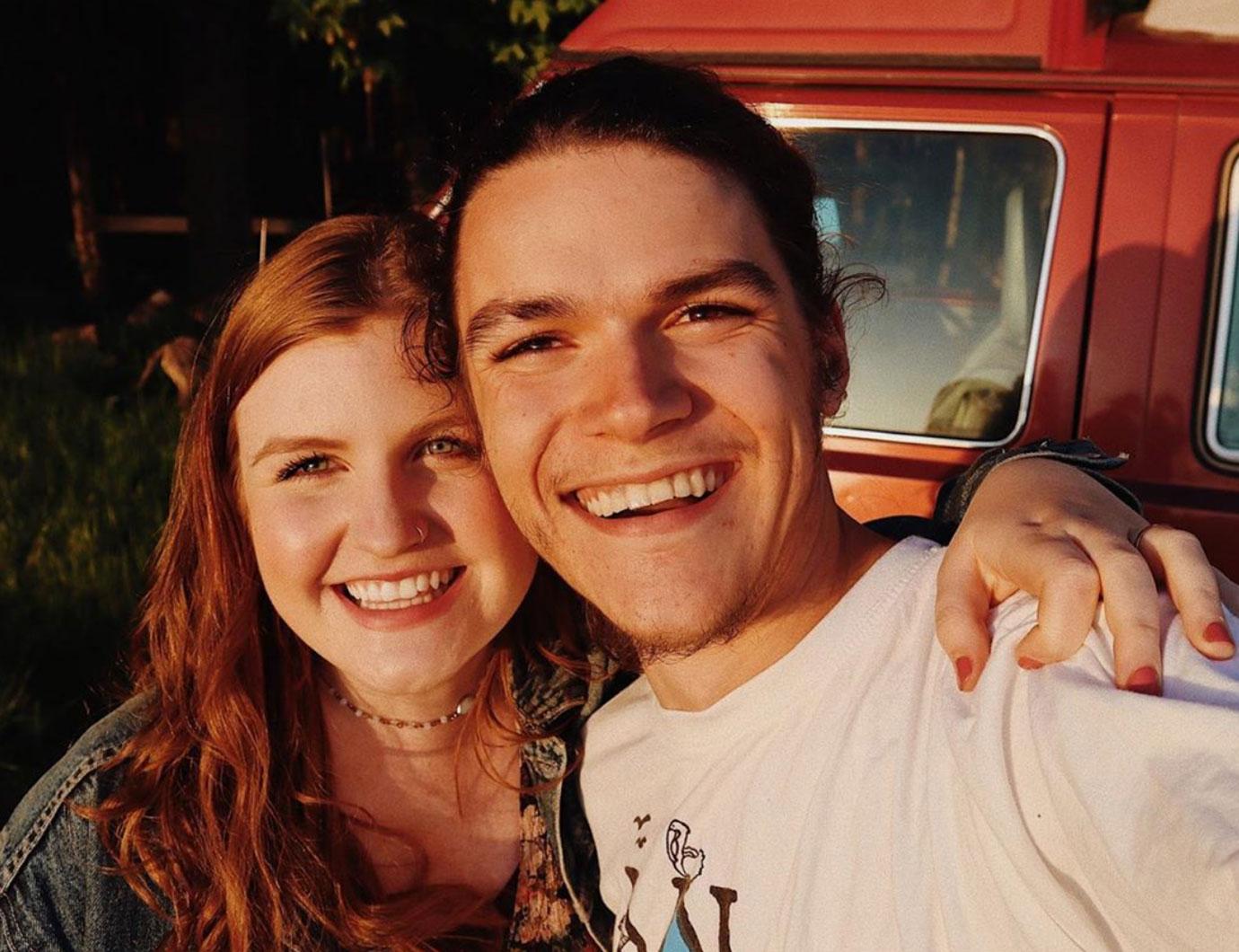 Smiling Isabel Rock Wearing Jean Jacket With Her Arm Around Smiling Jacob Roloffand