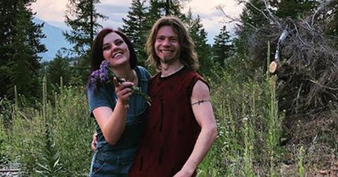 Bear Brown Raiven Adams Outdoors Posing and Smiling WIth Arms Around Each Other