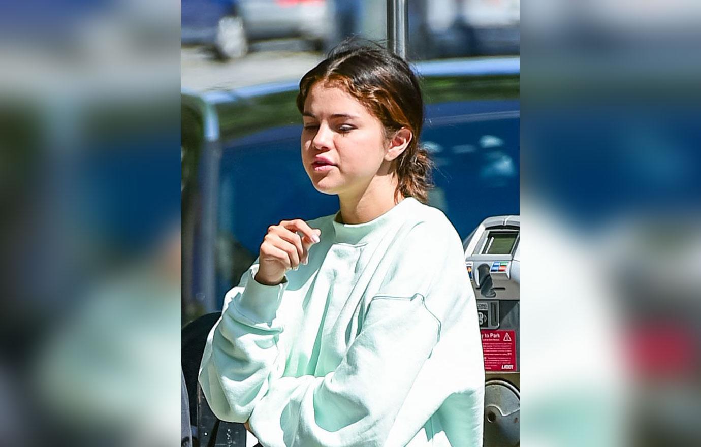 Selena Gomez looking puffy Weraing Mint Green Sweatsuit