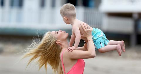 Heidi Montag Enjoys Beach Day in Sexy Pink One Piece with Spencer and Baby Gunner