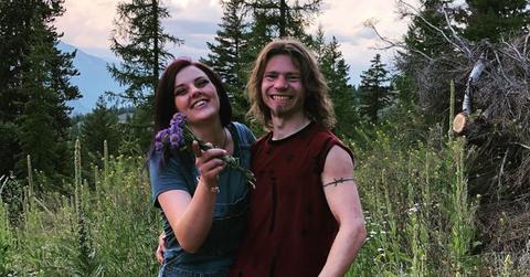 Bear Brown and Raiven Adams Pose Smiling Outside In Nature