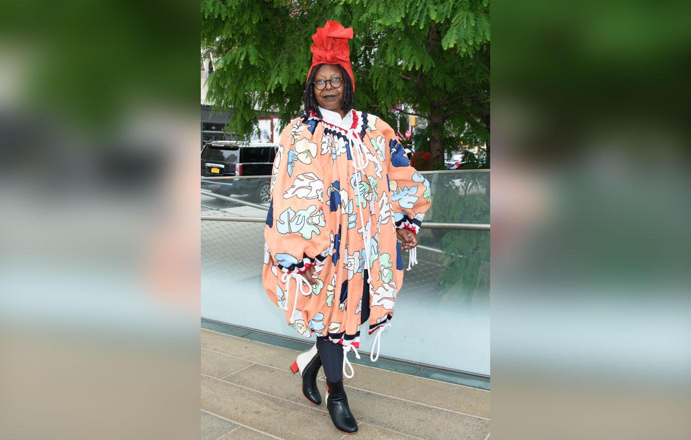 whoopi goldberg crazy outfit red hat new york