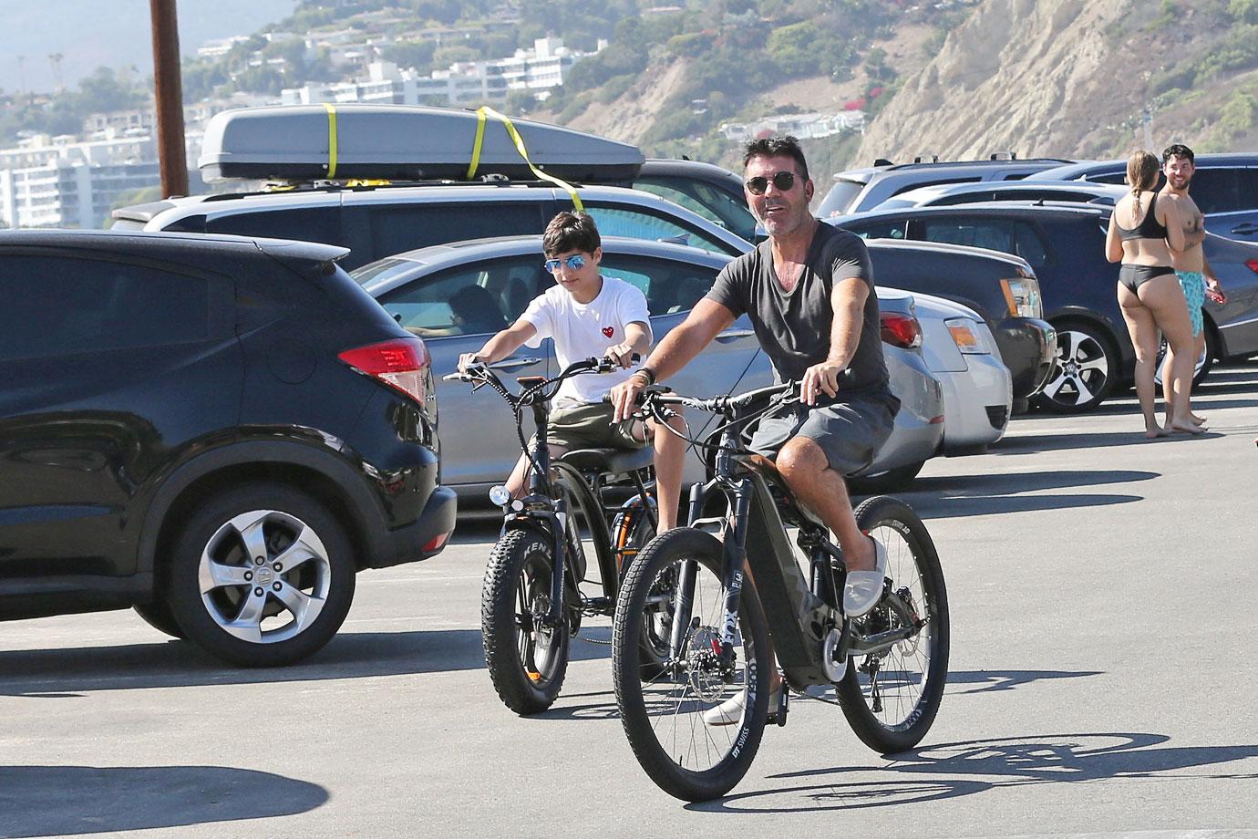 Simon Cowell Goes Bike Riding With His Family