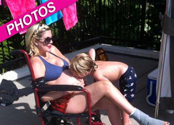 //tori spelling wheelchair bikini