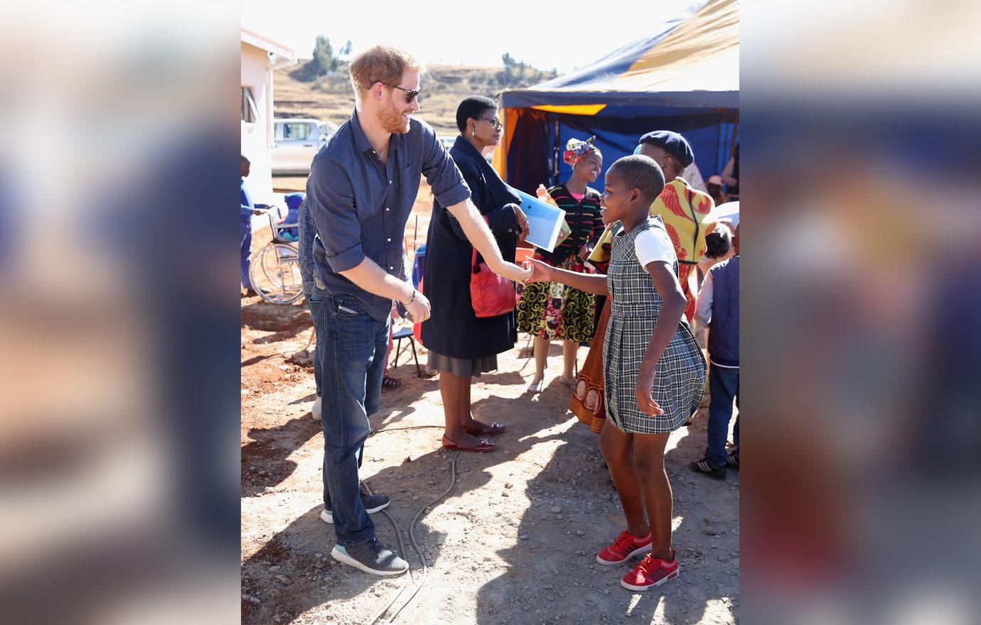 Prince Harry Plays With Children