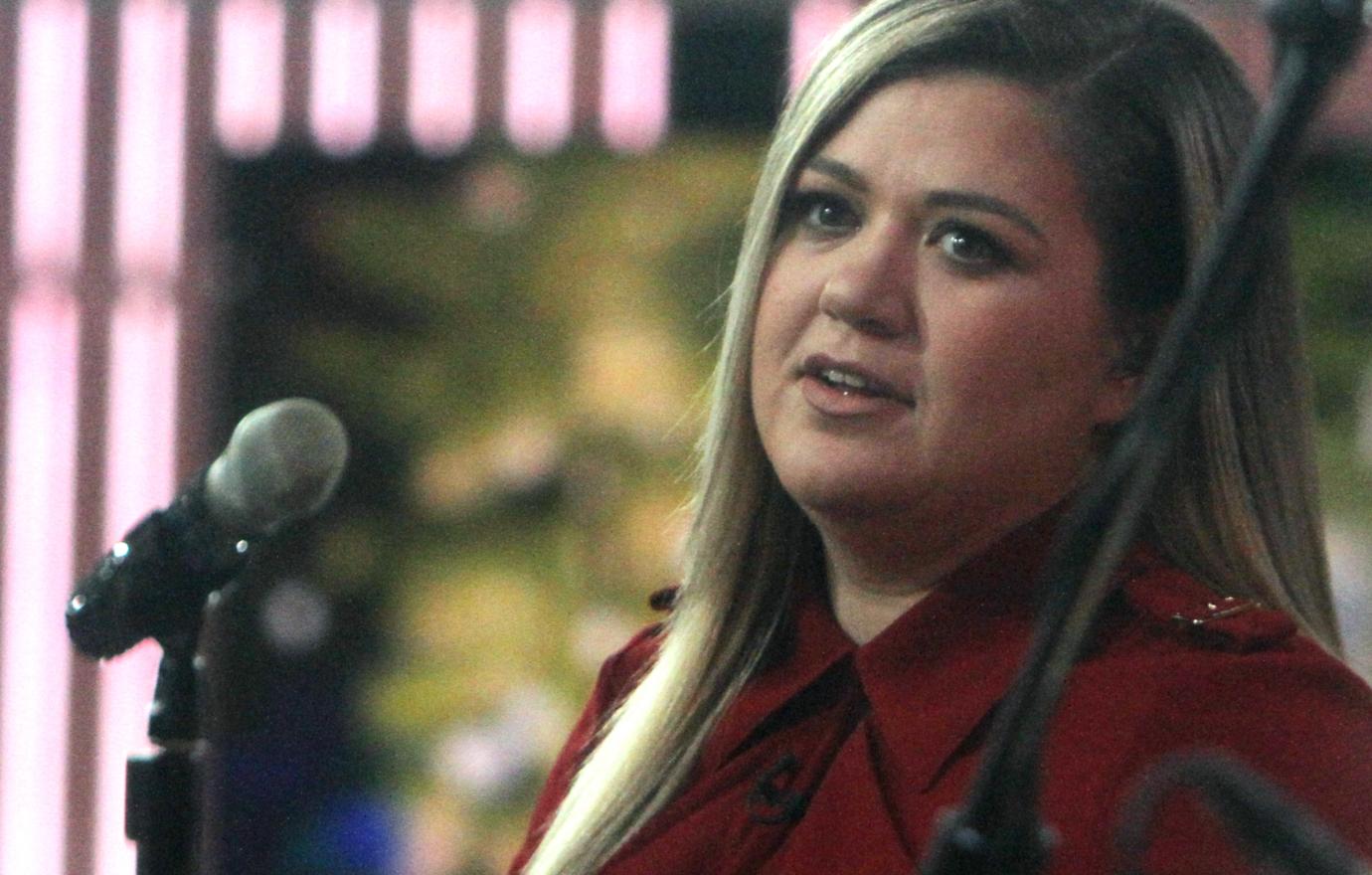 Kelly Clarkson dressed in red as a guest on the today show