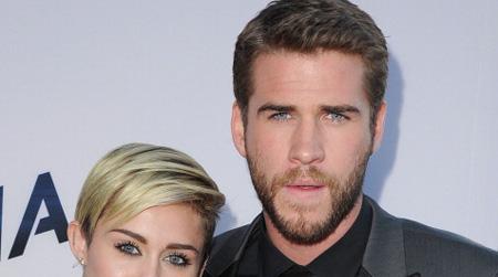 // miley cyrus and liam hemsworth arrives at gettyimages