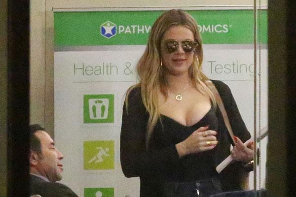 khloe kardashian plastic surgery implants photos