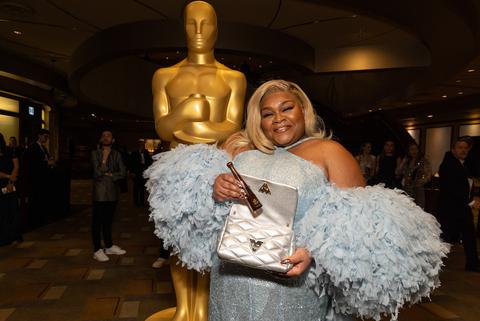 davine joy randolph gets in the celebratory spirit with tequila don julio as she walks the red carpet for the th annual oscars ceremony