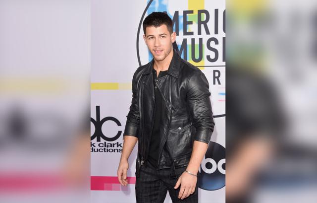 Nick Jonas Shows Off His Muscles At The