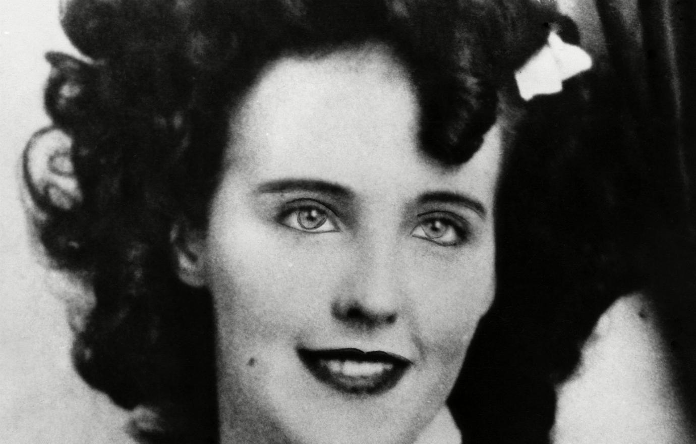 A black and white photo of Elizabeth Short.