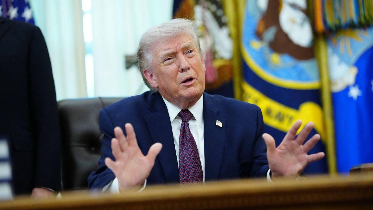 image of Trump previously said, 'I just like to watch her talk,' while avoiding a reporter's question.