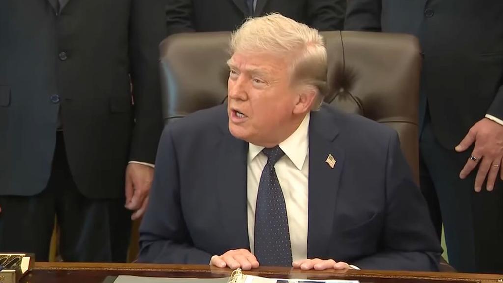 Trump Calls Female Reporter 'Such a Disgrace' in Heated Exchange