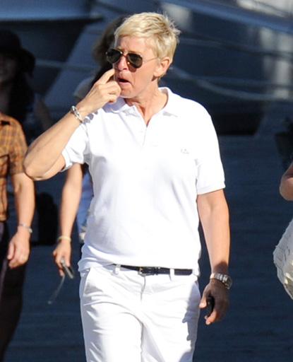 //ellen degeneres portia de rossi hold hands portofino