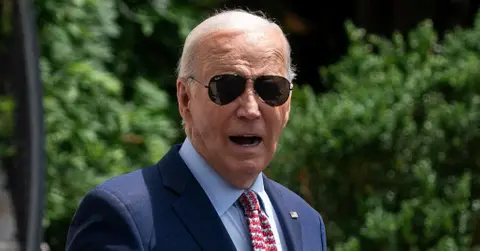 Picture of Joe Biden leaving to Camp David.