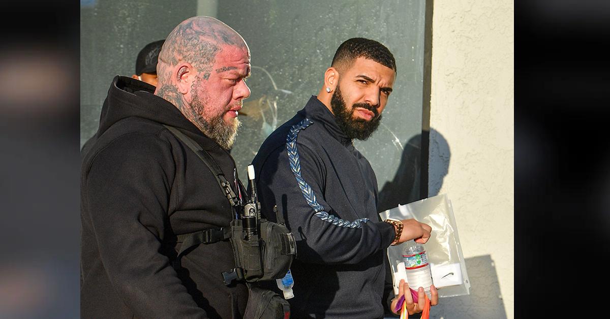 Drake with security in Beverly Hills