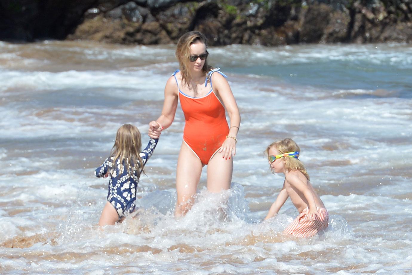 Olivia Wilde Wears Orange Swimsuit During Beach Day With Kids