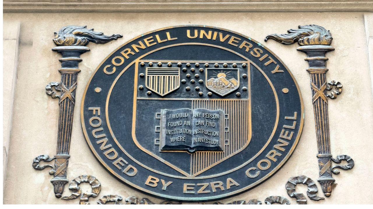 A photo of a Cornell University sign