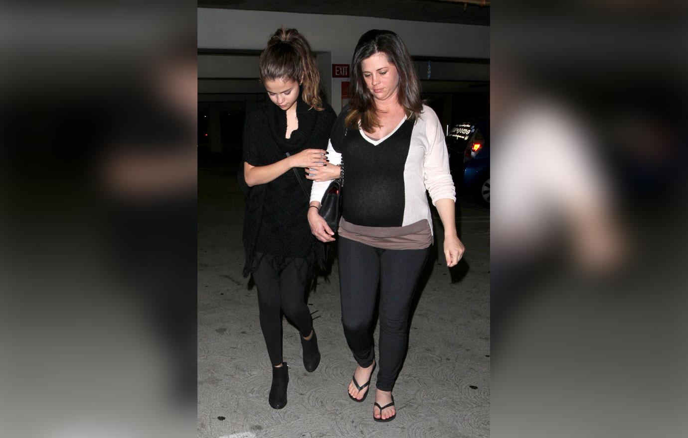 justin bieber desperate bid win over selena gomez mom