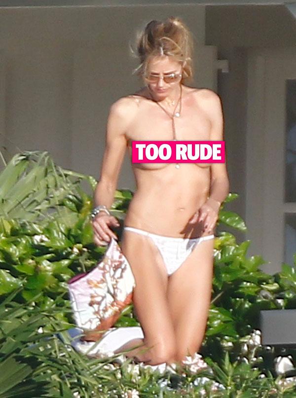 //Heidi Klum sunbathes topless thong boyfriend Vito Schnabel