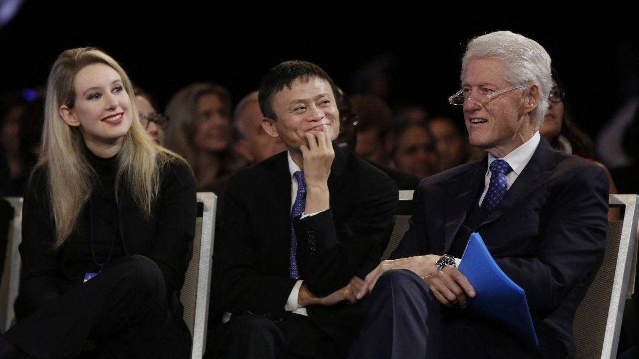 A photo of Elizabeth Holmes, Jack Ma, and Bill Clinton