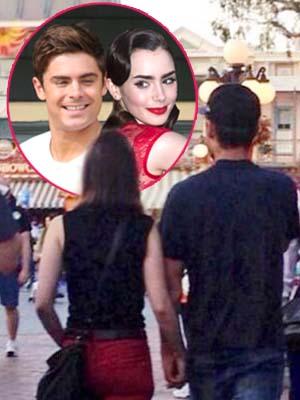 zac-efron-lily-collins-disneyland-california-holding-hands