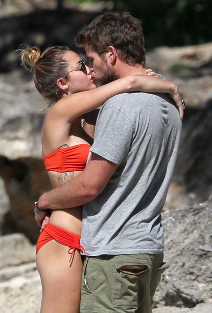 //miley cyrus bikini pda