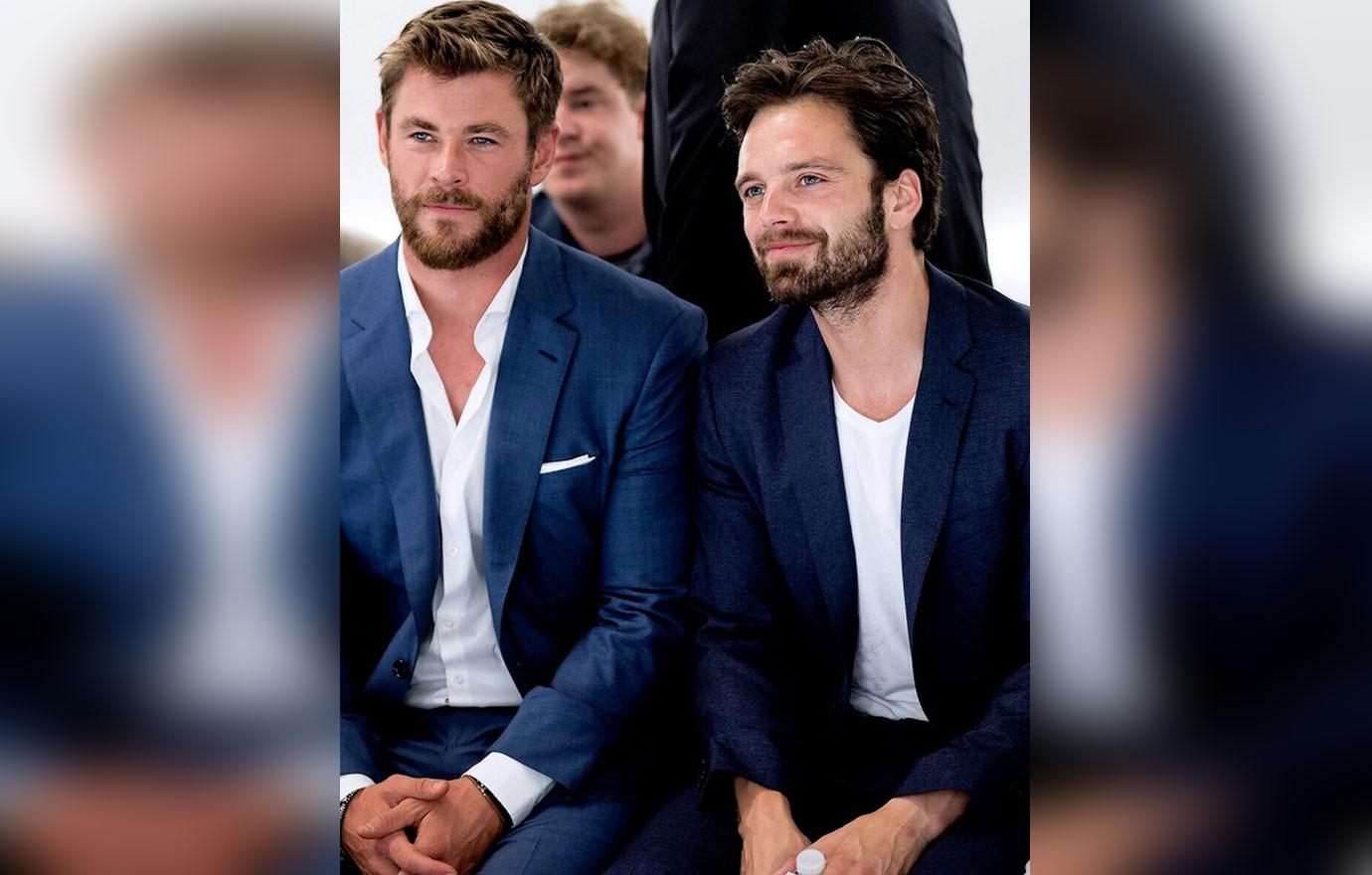 //Recently announced Boss Bottled Fragrance Ambassador Chris Hemsworth front row at BOSS Menswear Fashion Show Spring Summer  alongside Sebastian Stan