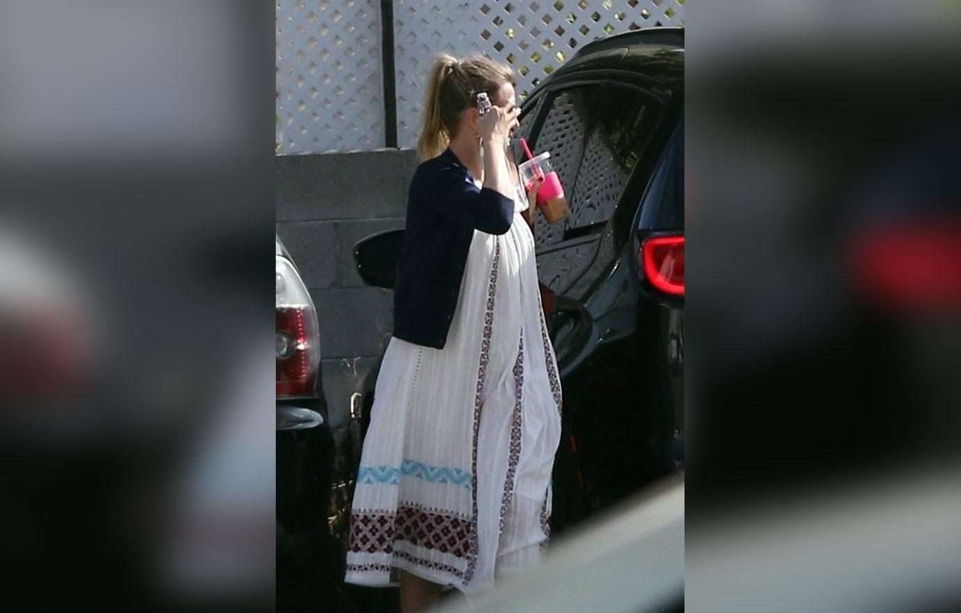 Cameron Diaz Desperately Trying To Hide Baby Bump In Grotesquely Oversized Clothes