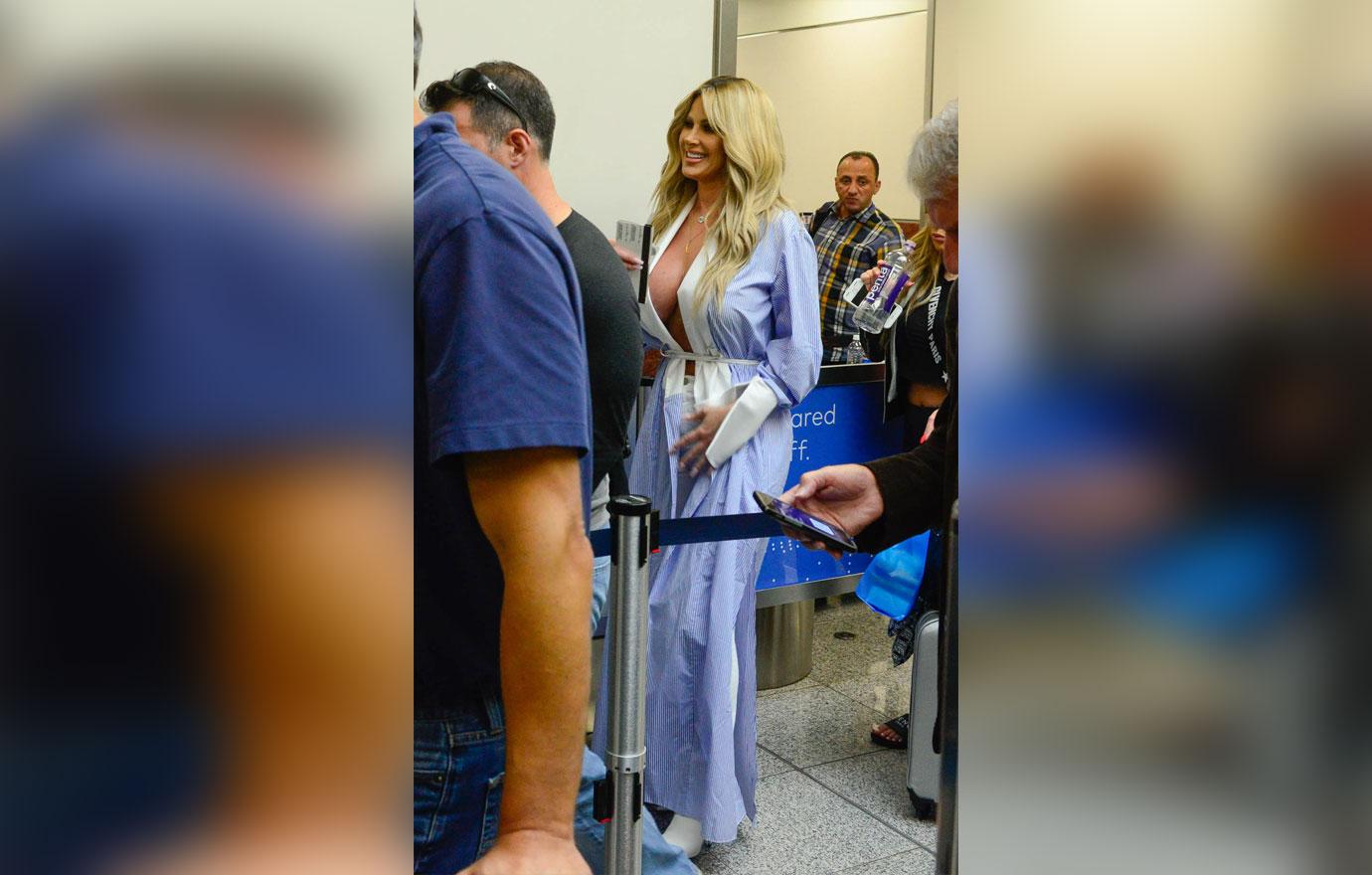 Kim Zolciak Boobs Robe Airport