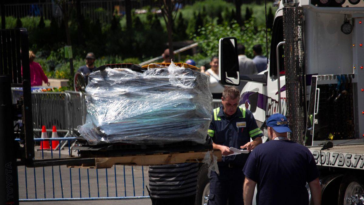 Workers have been seen bringing food, decor and set pieces into the venue.